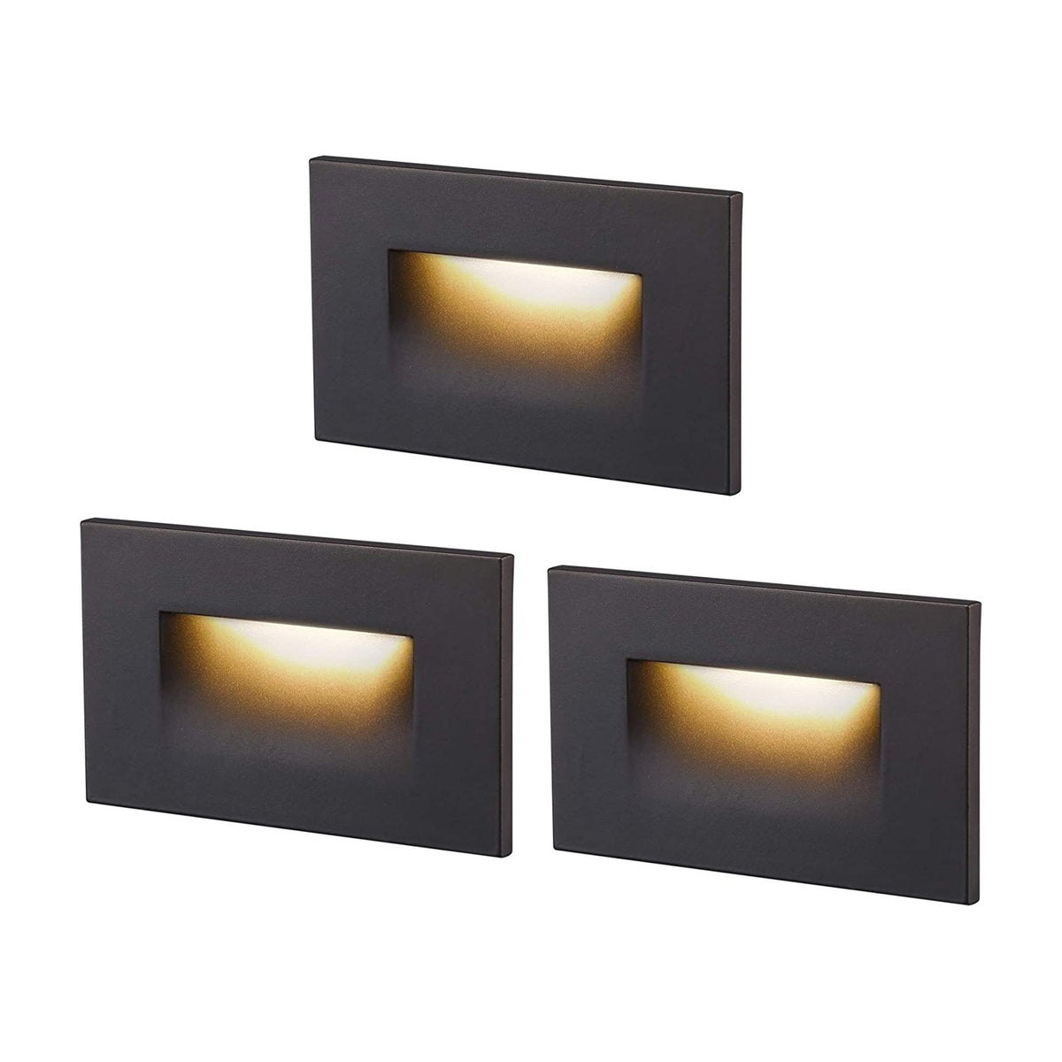 Cloudy Bay Three dark bronze rectangular LED step lights glowing warm, product shot on white background