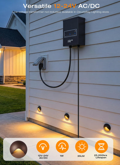 Cloudy Bay low voltage transformer powering half-moon LED deck lights along house siding at dusk with warm glow