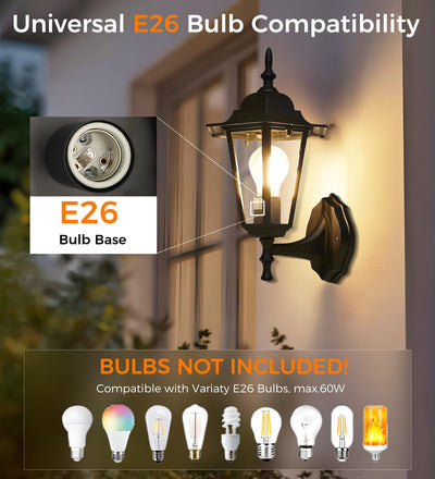 Two lantern sconces above a garage door, warm glow on the door and posts
