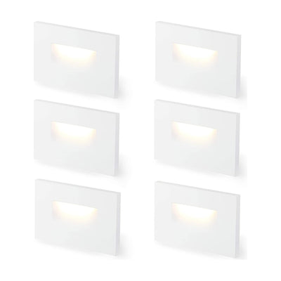 Cloudy Bay Six white rectangular LED step lights arranged on white background