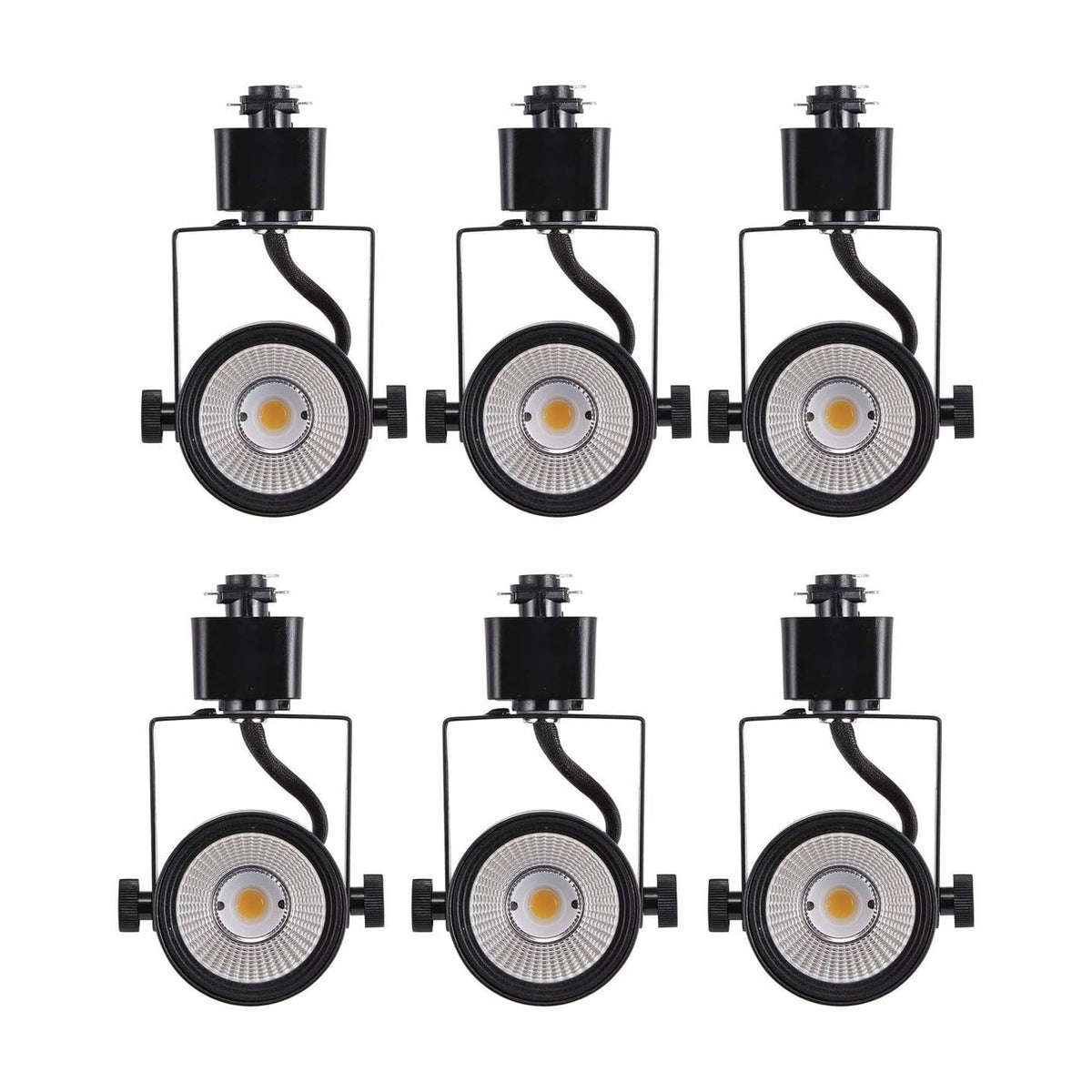 Black LED track light heads arranged in a white-background product shot